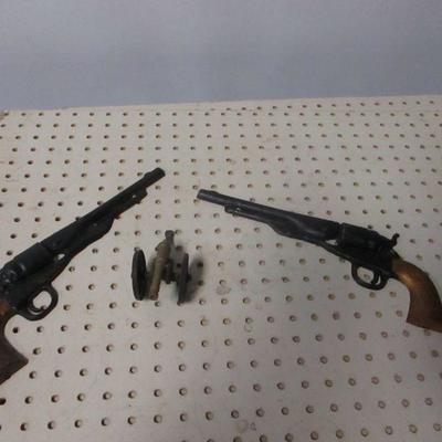 Lot 210 - Cast Iron Wall Hanging Guns & Cannon