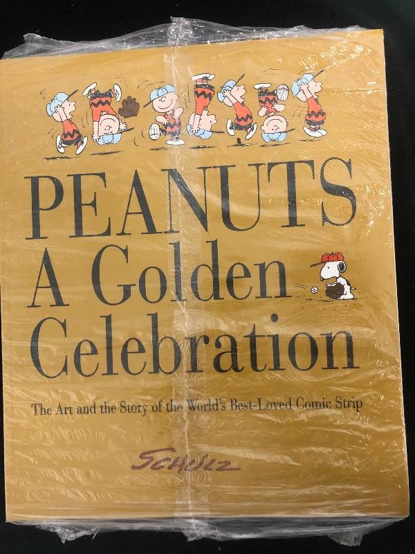 #60 New in rapper peanuts a golden celebration book | EstateSales.org