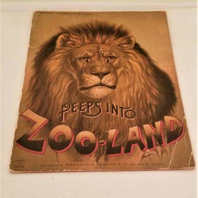 Lot #319  Antique Children's Book - Peeps into Zoo-land  - early 20th century