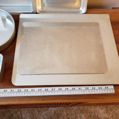 Lot 19: (10) piece Cake/Bread Pan & Cookie Sheets Lot