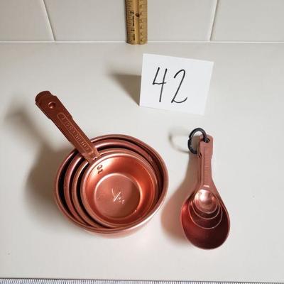 Lot 42: Vintage Copper Measuring Cups & Spoons