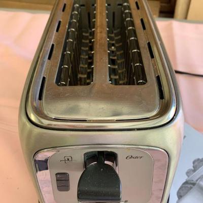 LOT 185  OSTER TOASTER 