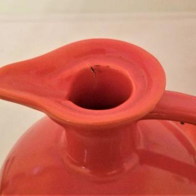 Lot #342  Two Pieces of Vintage Fiesta Ware - Teapot and Water Pitcher