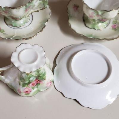Lot 57: Unmarked Antique Demitasse Cups and Saucers