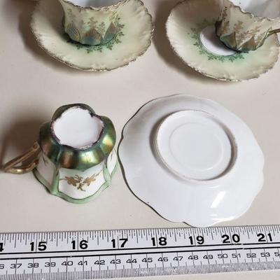 Lot 57: Unmarked Antique Demitasse Cups and Saucers