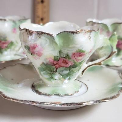 Lot 57: Unmarked Antique Demitasse Cups and Saucers