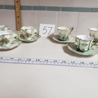 Lot 57: Unmarked Antique Demitasse Cups and Saucers