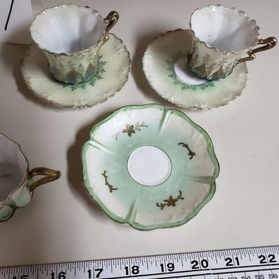 Lot 57: Unmarked Antique Demitasse Cups and Saucers