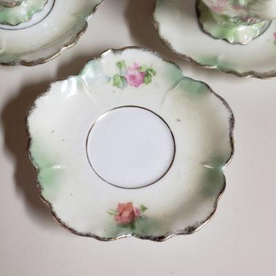 Lot 57: Unmarked Antique Demitasse Cups and Saucers