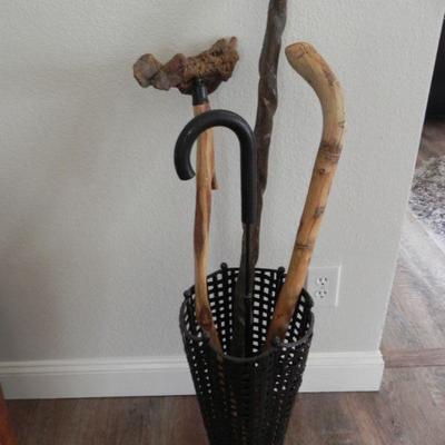 LOT 10  UMBRELLA HOLDER & CARVED WOODEN CANES, WALKING STICKS