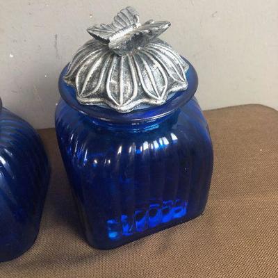 #215 2 Blue Glass Canisters. 