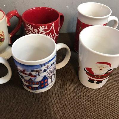#277 (7) Holiday themed Coffee Mugs 1 is Thomas Kinkade 