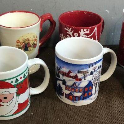 #277 (7) Holiday themed Coffee Mugs 1 is Thomas Kinkade 