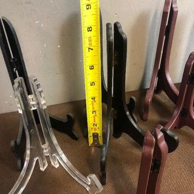 #297 Lot B is Group of Wood and plastic Plate Stands