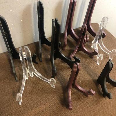 #297 Lot B is Group of Wood and plastic Plate Stands