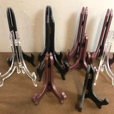 #297 Lot B is Group of Wood and plastic Plate Stands