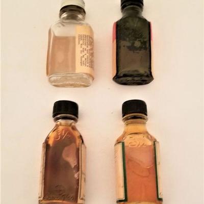Lot #354  Four Vintage Bottles of Quack Medicine from local Pharmacies