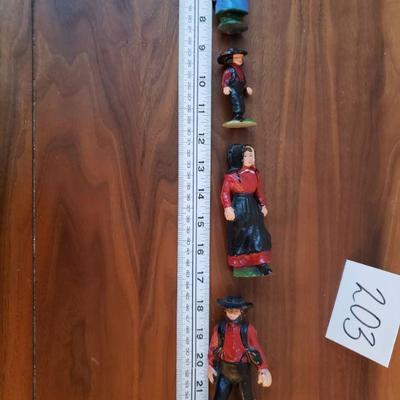 Lot 203: Vintage Cast Iron Amish Family