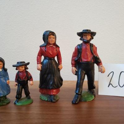 Lot 203: Vintage Cast Iron Amish Family