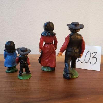 Lot 203: Vintage Cast Iron Amish Family
