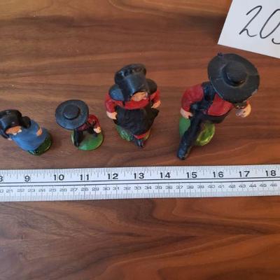 Lot 203: Vintage Cast Iron Amish Family
