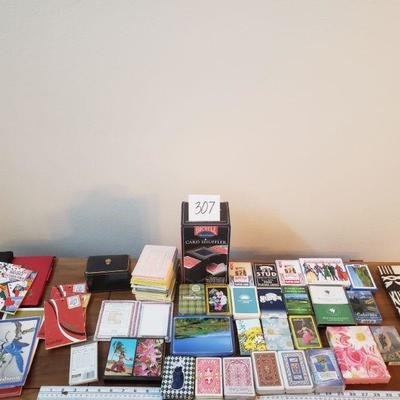 Lot 307: Vintage Playing Cards, Score Cards/Books and shuffle 