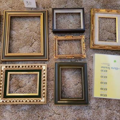 LOT 311: Vintage Wood Frames and One Clear Plastic Frame 