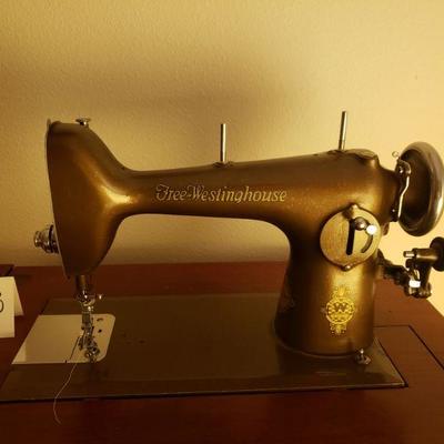 Lot 323: Vintage Westinghouse Sewing Machine in Cabinet 