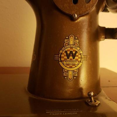 Lot 323: Vintage Westinghouse Sewing Machine in Cabinet 