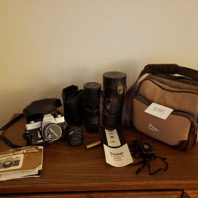 Lot 335: Vintage 35mm Minolta Camera plus 2 Other Lens