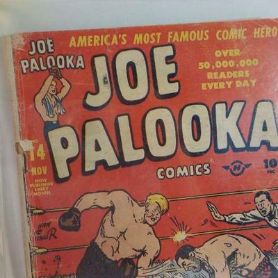 2 Famous early comic books, " Joe Palooka" and "Nancy and Sluggo."