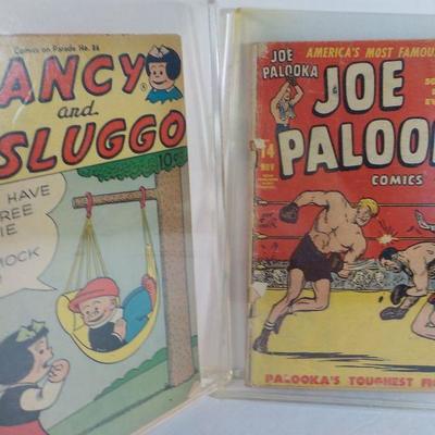 2 Famous early comic books, " Joe Palooka" and "Nancy and Sluggo."
