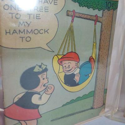 2 Famous early comic books, " Joe Palooka" and "Nancy and Sluggo."