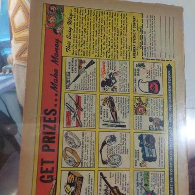 2 Famous early comic books, " Joe Palooka" and "Nancy and Sluggo."