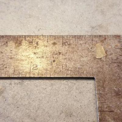 LOT #398: Measuring Tape and (2) Angle Rulers