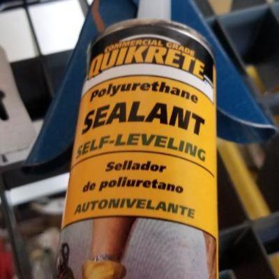 LOT #409: Caulk Gun w/ Tubes of Concrete Patch and Poly Sealant