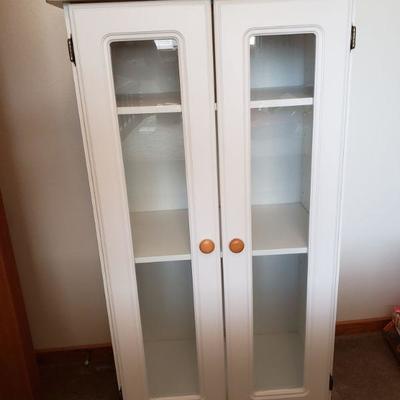 Lot 608: White Cabinet with Double Doors ( 27" Ã— 15" Ã— 48" )