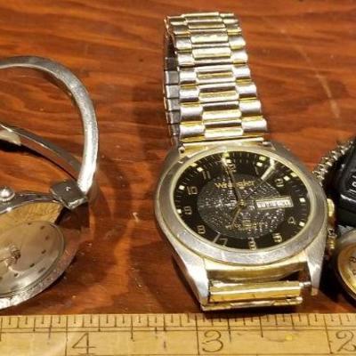 LOT #665: Group of Assorted Watches (only Silver one is running)
