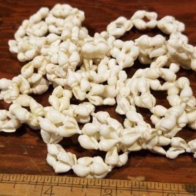 LOT #673: Assortment of Vintage Shell Necklaces and Earrings