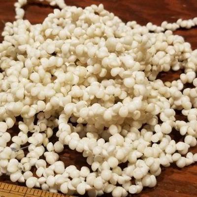 LOT #673: Assortment of Vintage Shell Necklaces and Earrings