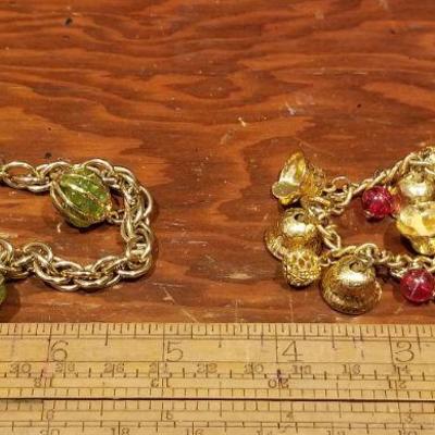 LOT #674: Pair of Women's Charm Bracelets 