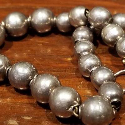 LOT #676: Sterling Silver Earrings and Bracelet?