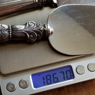 LOT #688: (2) Sterling Silver Vintage Cake Knives 
