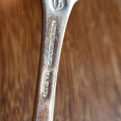 LOT #696: Two Vintage Monogrammed  Sterling Silver Gravy Spoons
