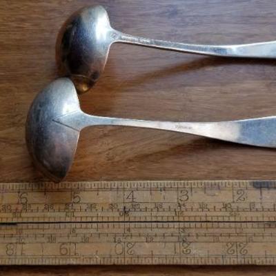 LOT #696: Two Vintage Monogrammed  Sterling Silver Gravy Spoons