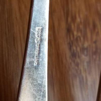 LOT #696: Two Vintage Monogrammed  Sterling Silver Gravy Spoons