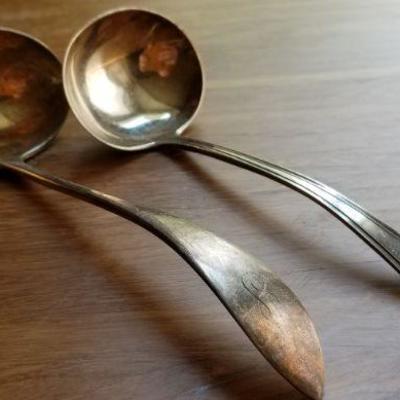 LOT #696: Two Vintage Monogrammed  Sterling Silver Gravy Spoons