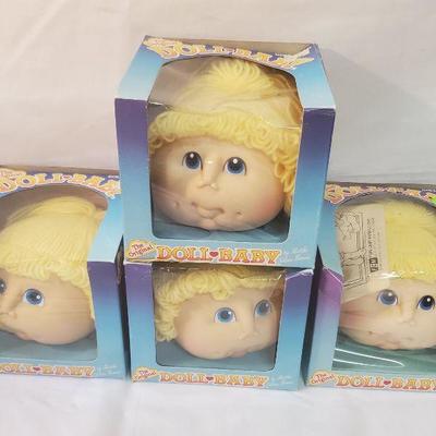 LOT OF 4 ORIGINAL BABY DOLL HEADS 