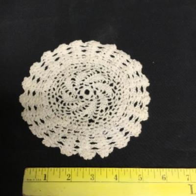 4 Small Doilies
