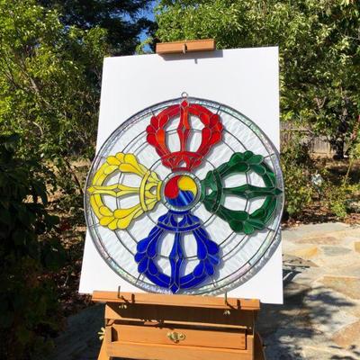 Striking Multi Color Stained Glass Window featuring Red Yellow Green and Blue